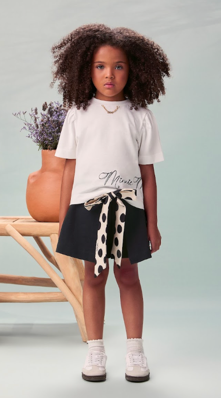 Conjunto Infantil T-Shirt Minnie Mouse Pingente e Shorts Saia Preto Laço Poá - Animê