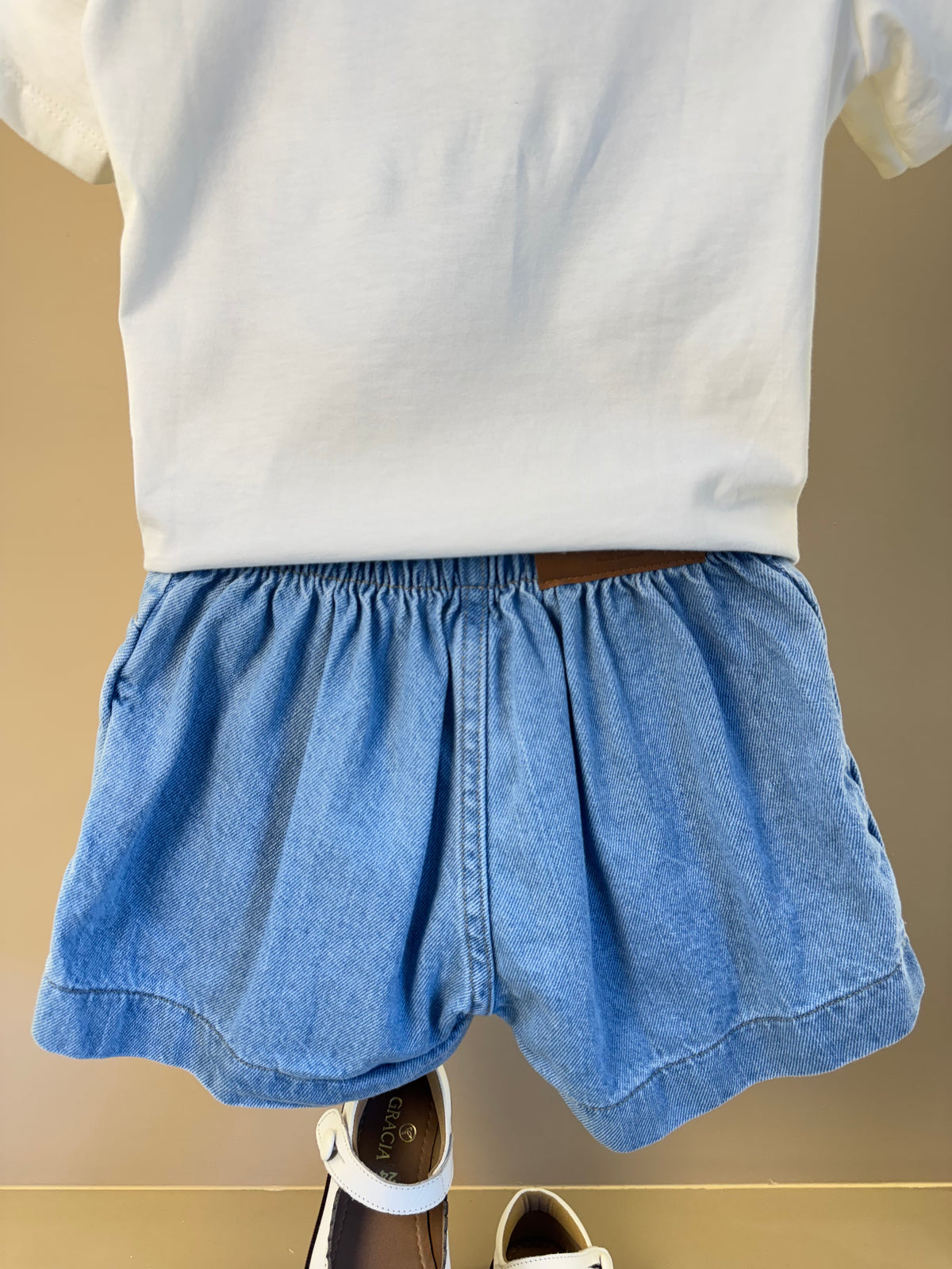 Conjunto Infantil Blusa Limões Com Strass e Shorts Saia Jeans Com Pregas - Momi