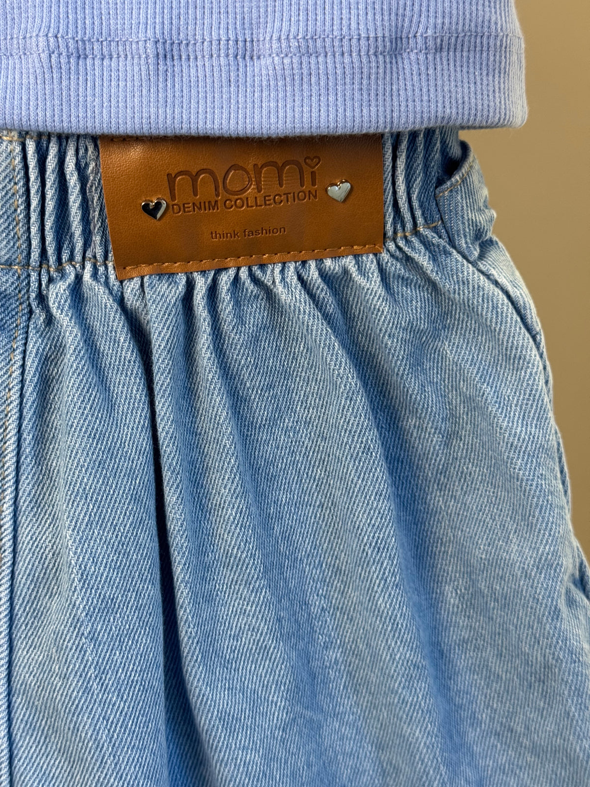 Conjunto Infantil Regata Lilás Estampa Limões e Shorts Saia Jeans Com Pregas - Momi