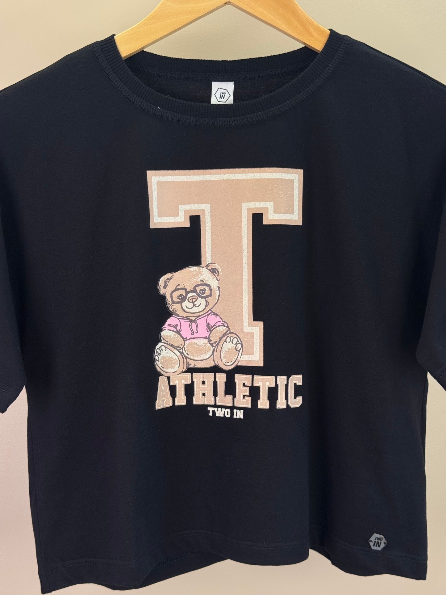 Conjunto Teen Camiseta Oversized e Saia-Shorts com Tachas Preta - Two In