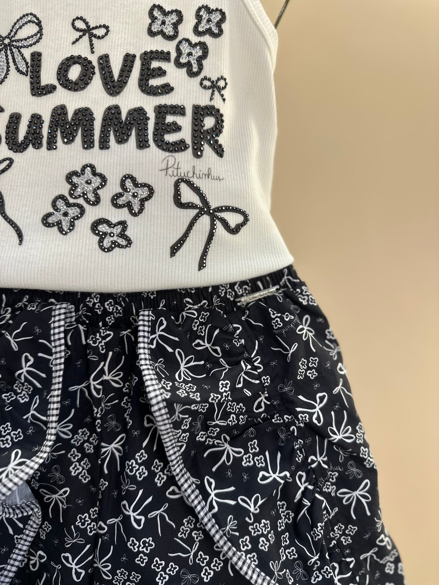 Conjunto Infantil  Blusa Love Summer Cristal e Saia-Shorts Mullet Laços e Flores - Pituchinhus