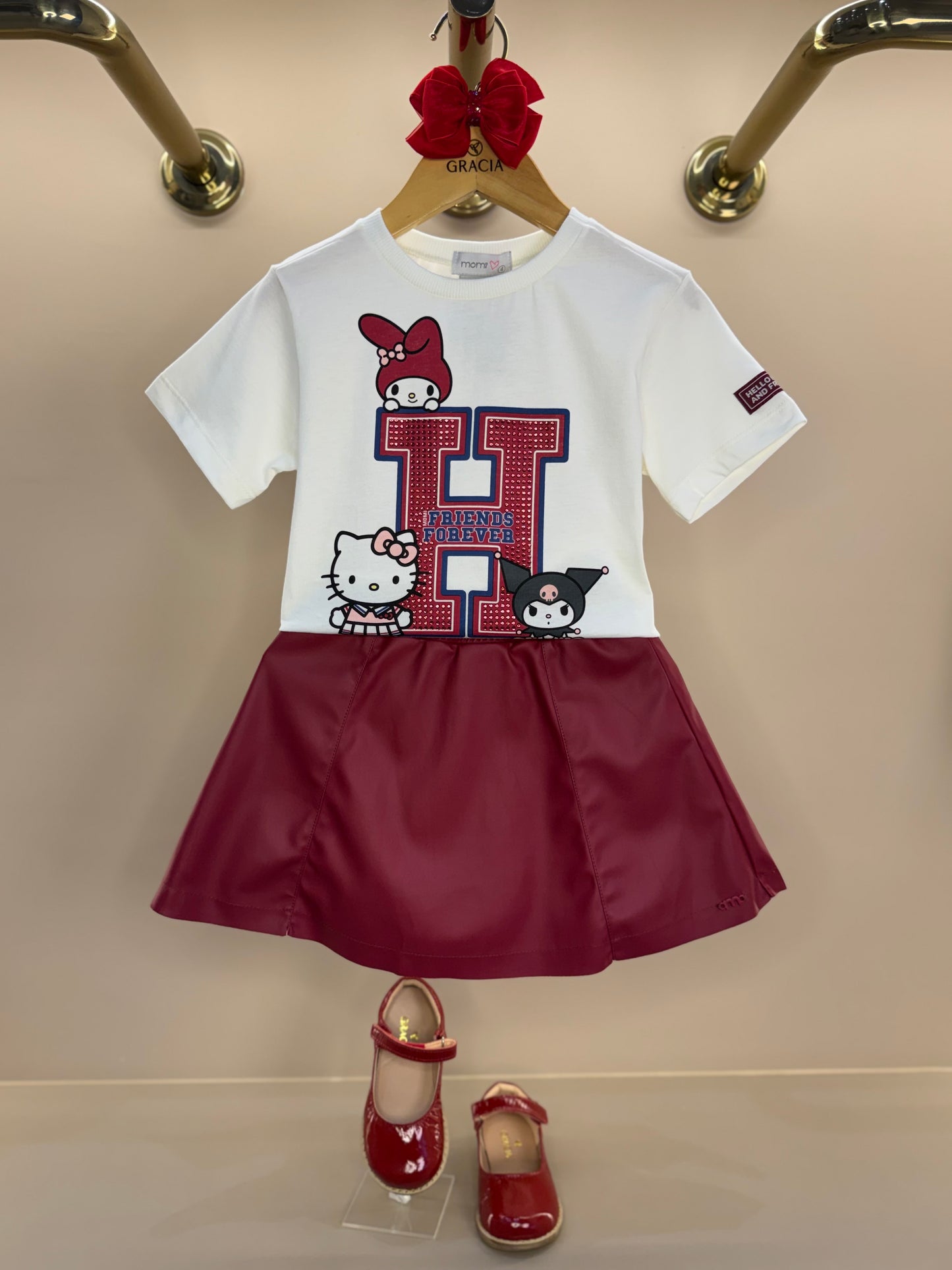 Conjunto Infantil Blusa Hello Kitty Strass e Saia Infantil Couro Tech Recortes Cramberry - Momi