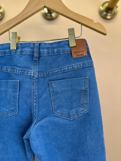 Conjunto Infantil Sobreposição Jeans, Blusa Manga Bufante e Calça Plissada - Animê