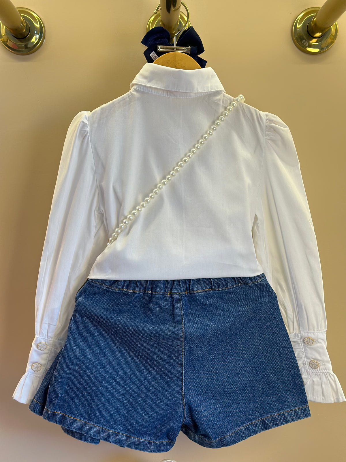 Conjunto Infantil Camisa Babadinhos Punho Pregas Branca e Saia  Jeans Pochete Laço Pérolas - Luluzinha