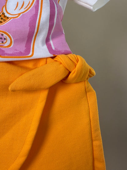 Conjunto Infantil Blusa Minnie Love e Shorts Saia Laranja Com Sobreposição - Animê