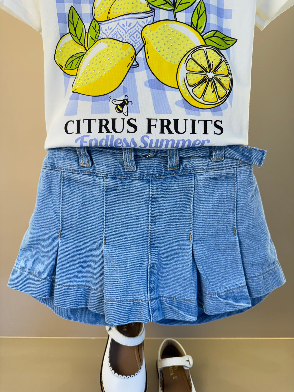 Conjunto Infantil Blusa Limões Com Strass e Shorts Saia Jeans Com Pregas - Momi
