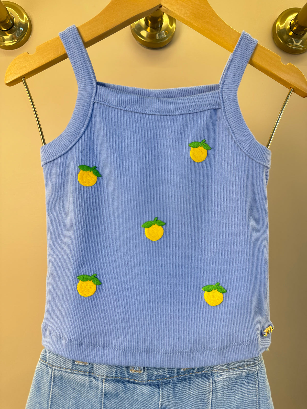 Conjunto Infantil Regata Lilás Estampa Limões e Shorts Saia Jeans Com Pregas - Momi