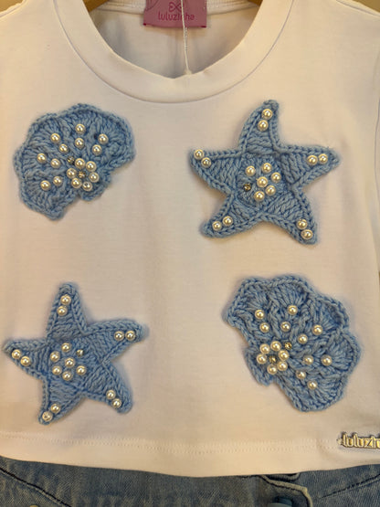 Conjunto Infantil Blusa Algodão Conchas e Shorts-saia Jeans Bordados e Crochê Estrelas do Mar - Luluzinha