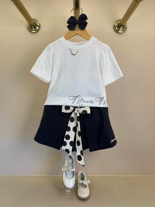 Conjunto Infantil T-Shirt Minnie Mouse Pingente e Shorts Saia Preto Laço Poá - Animê