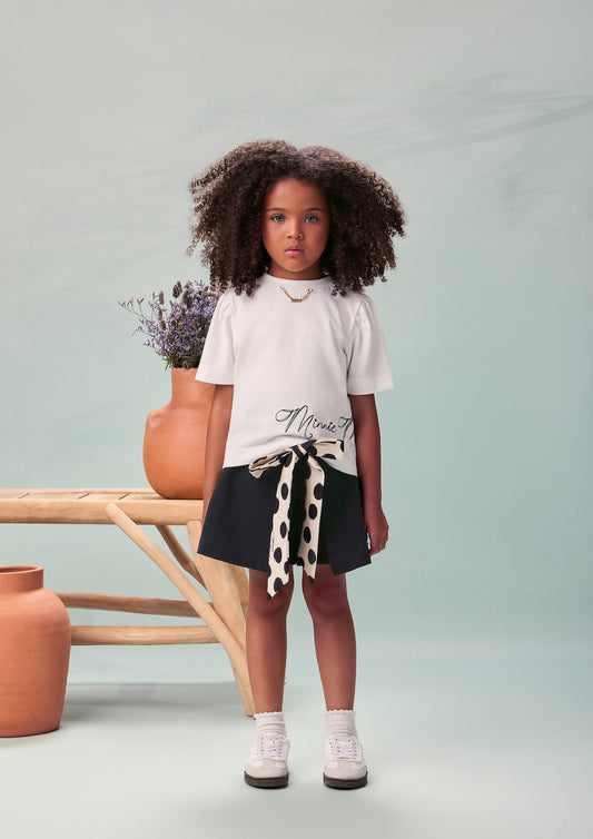 Conjunto Infantil T-Shirt Minnie Mouse Pingente e Shorts Saia Preto Laço Poá - Animê