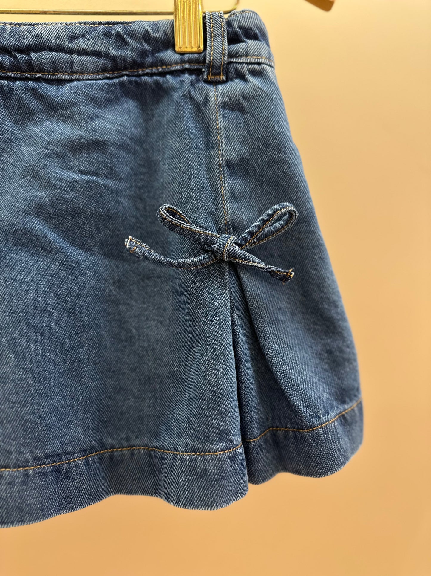 Shorts-Saia Infantil Jeans com Laços - Momi