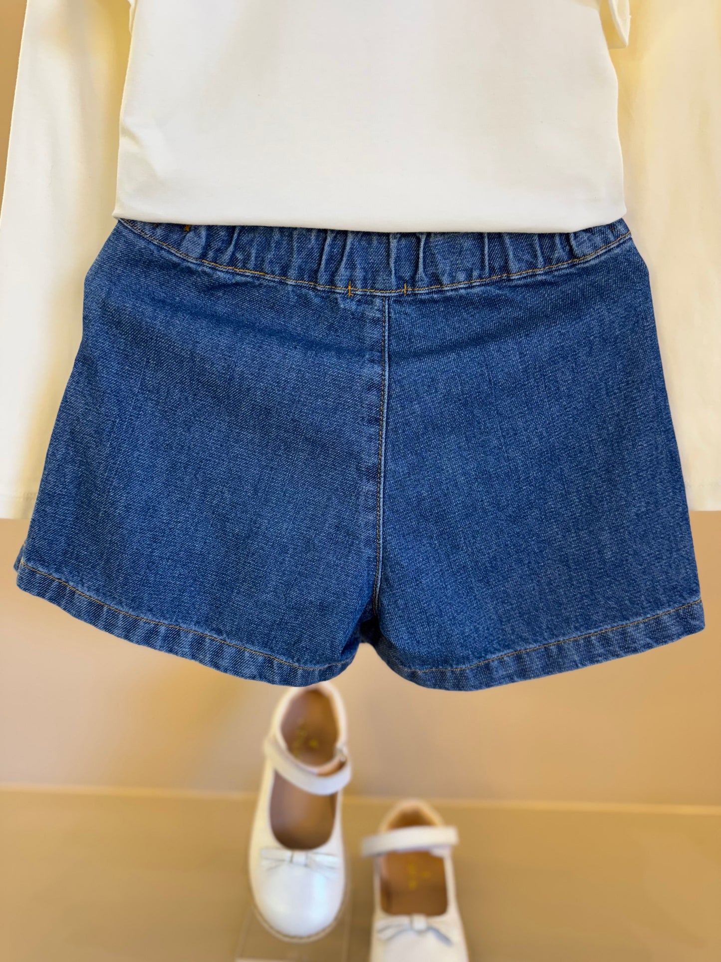 Conjunto Infantil Blusa ML Laço e Saia-shorts Jeans Pochete Laço Pérolas - Luluzinha