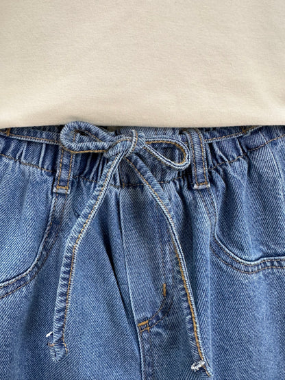 Conjunto Infantil Blusa Lenço Estampado Amarrado Na Gola e Calça Jeans Wide Leg Cós Alto Com Elástico - Momi
