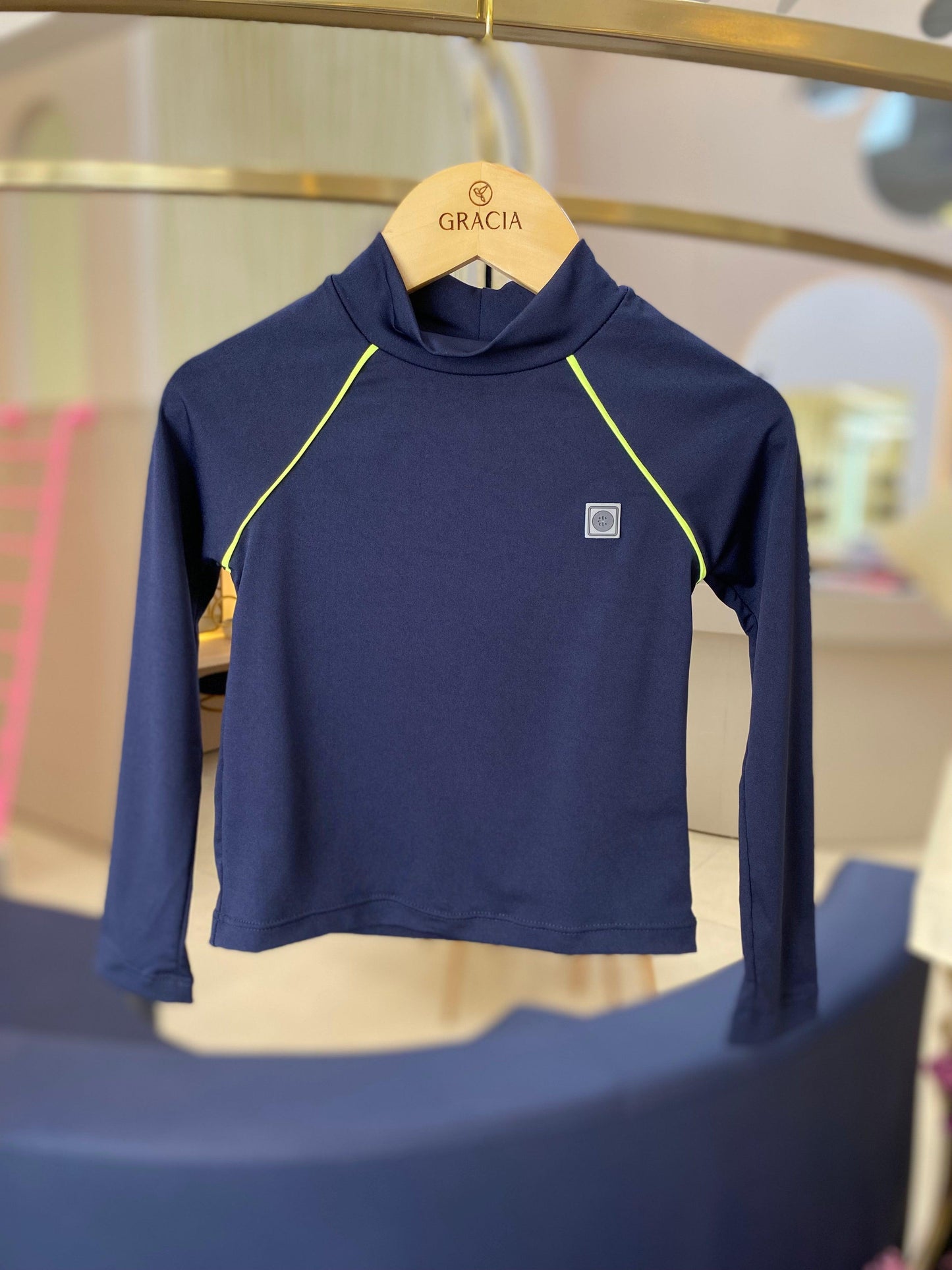 Blusa surfista com proteção UV Um Mais Um - Gracia